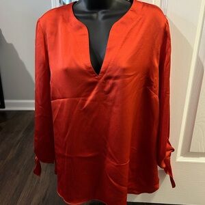 Michael Kors Vibrant Red women’s textured satin tie wrist pullover blouse.